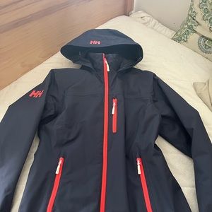 Helly Hansen navy blue (pink piping on zippers) waterproof lined women’s jacket